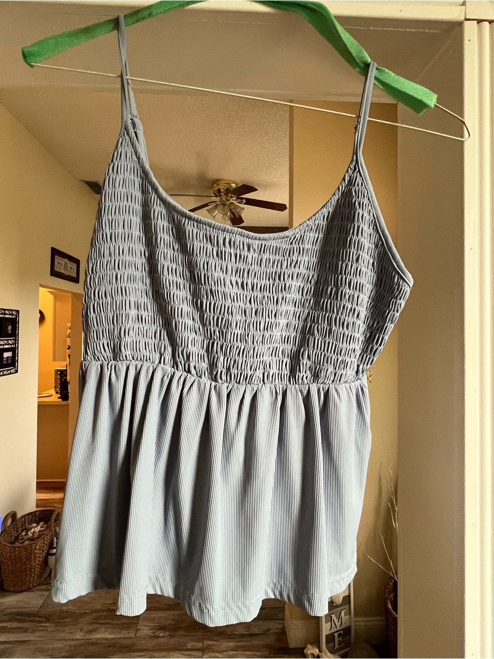 Smocked Spaghetti Strap Peplum Tank Top - Light blue. Cropped